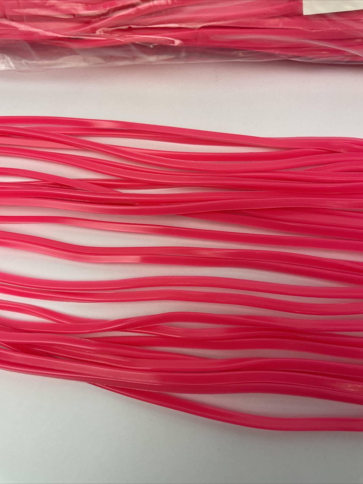 Newell MFG pink offshore trolling fishing skirts 10 pack for tuna and marlin lures.