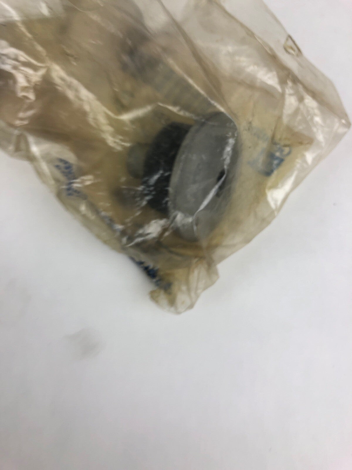 GM 15834275 front shock upper insulator OEM suspension mount cushion for vibration isolation and shock absorber support.