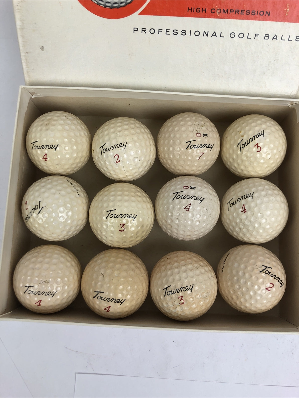 Vintage original dozen MacGregor Tourney I DX assorted professional golf balls collectible set