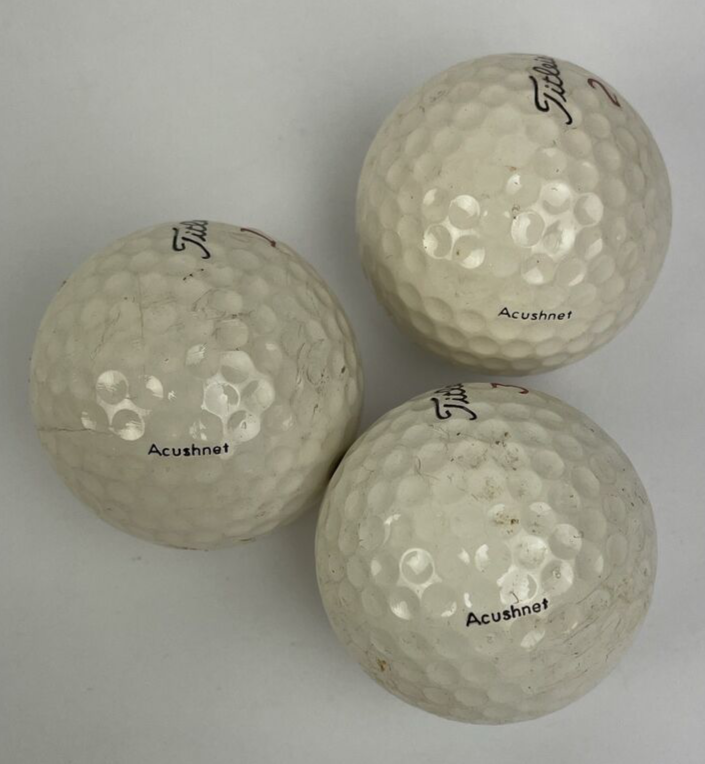 Vintage Titleist by Acushnet golf balls set of 3 numbers 1 2 and 3 collectible golf memorabilia display collection item