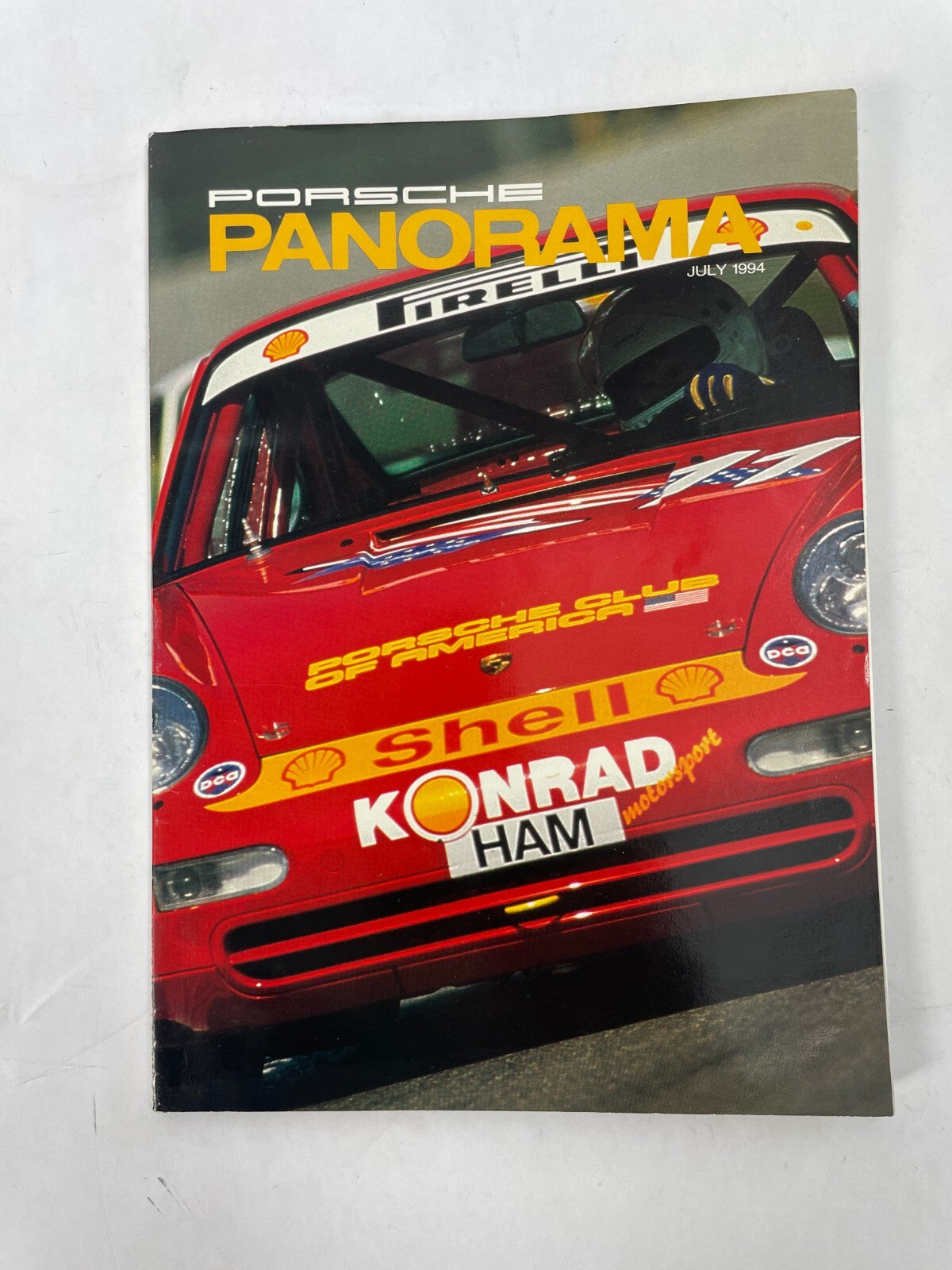 July 1994 Porsche Panorama Magazine The Porsche team is greeted with flowers