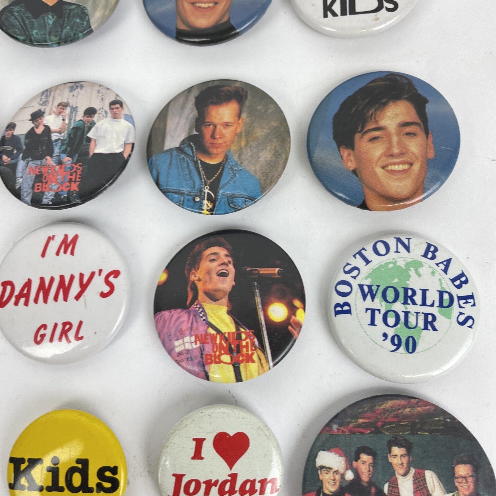 Lot of 45 New Kids On The Block buttons pins keychain and vintage NKOTB collectibles from the 90s and Y2K era
