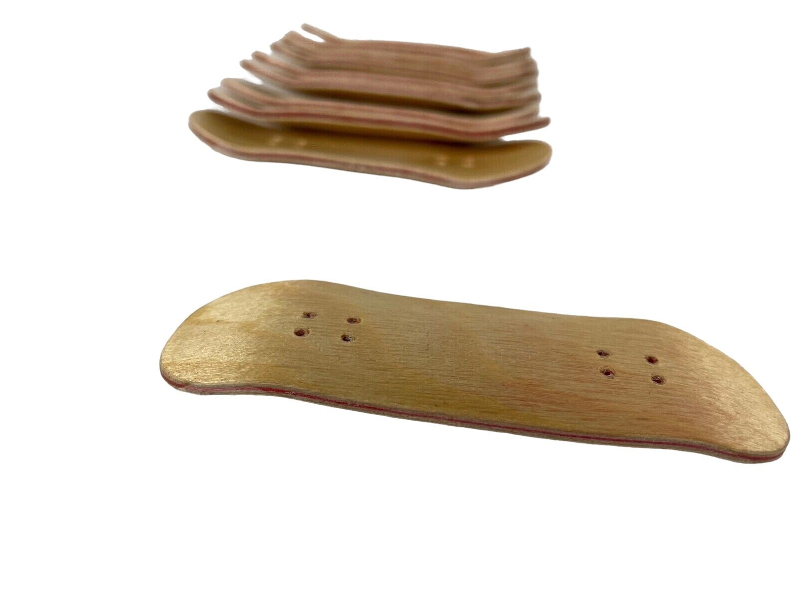 Lot of 10 premium wooden fingerboards with natural wood grain finish.