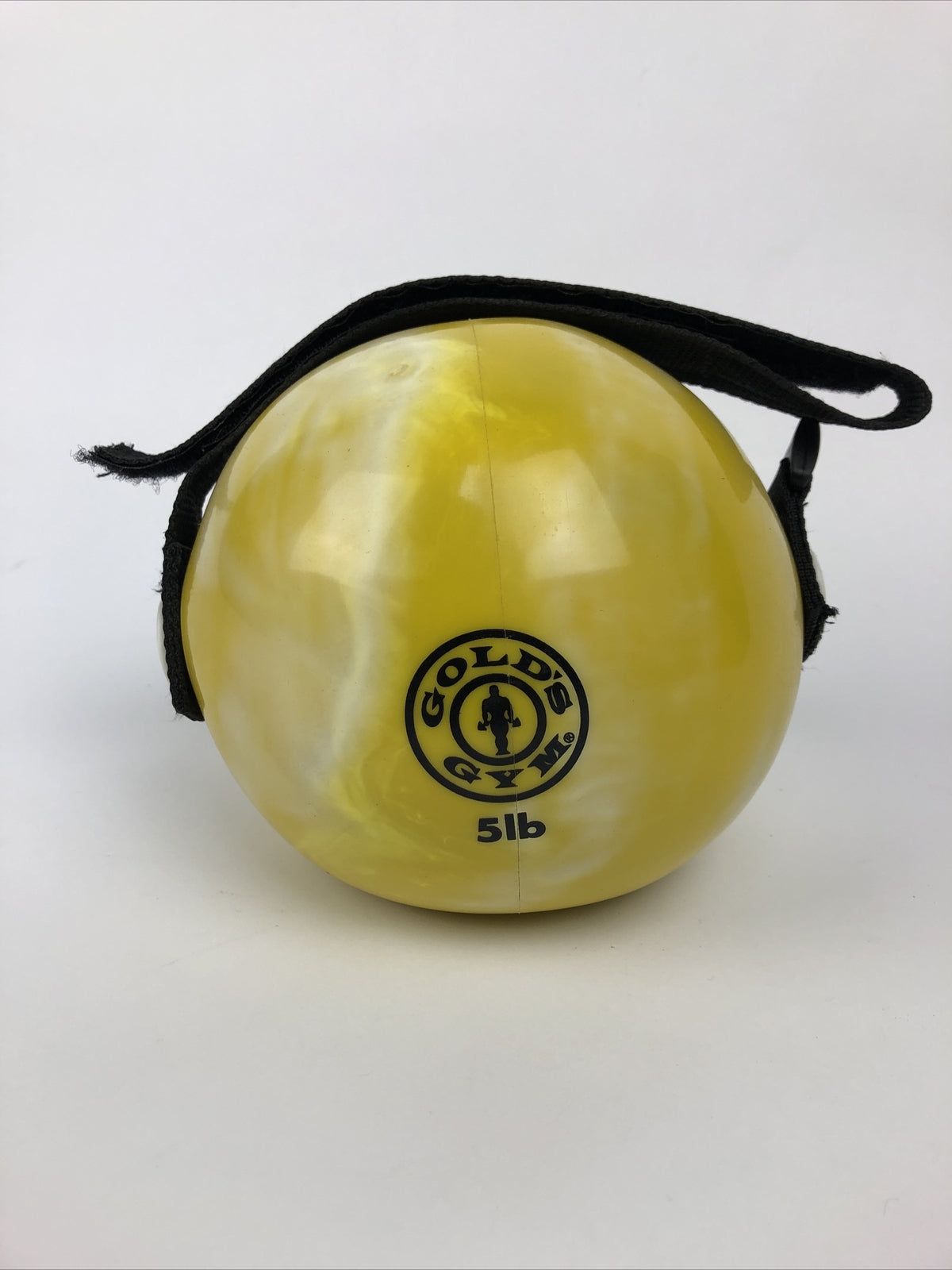 Gold's Gym 5 lb soft weighted medicine ball with handles in black and yellow for home workouts