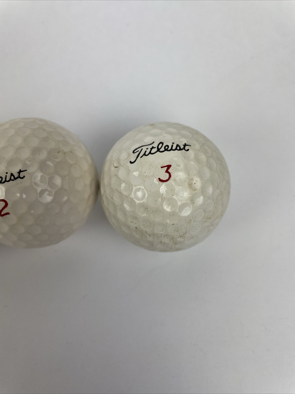 Vintage Titleist by Acushnet golf balls set of 3 numbers 1 2 and 3 collectible golf memorabilia display collection item
