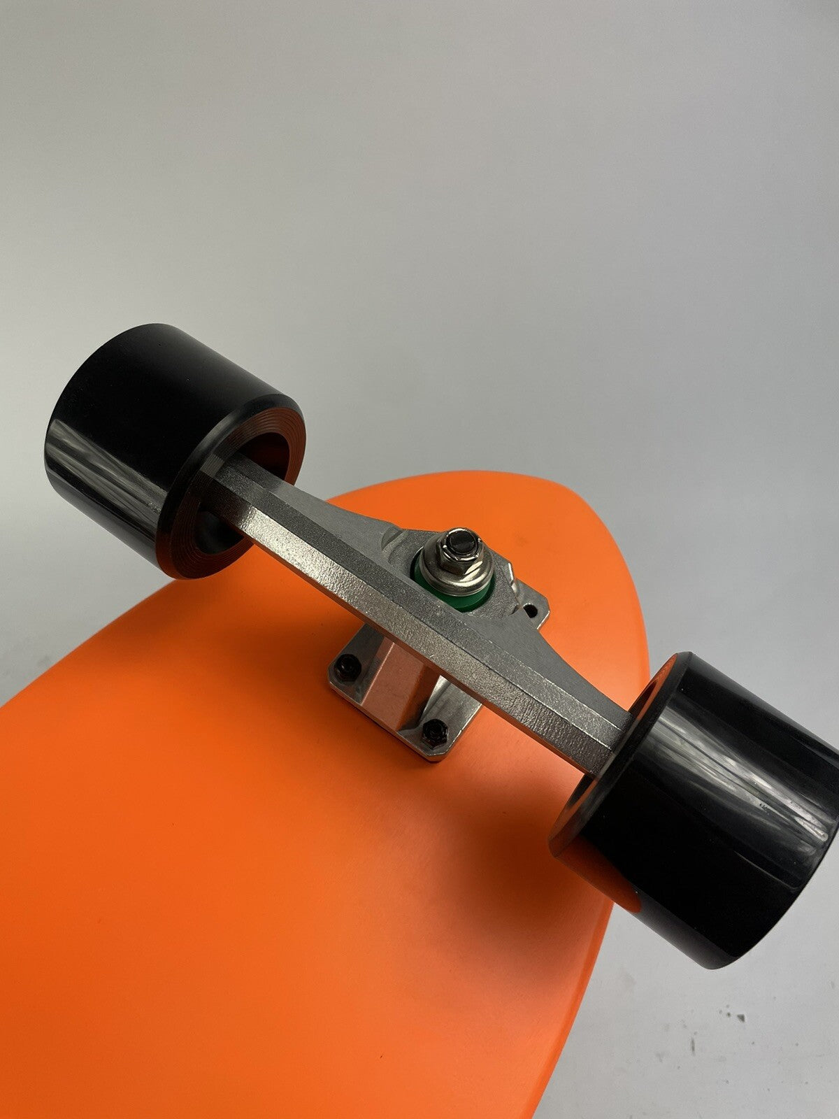 Orange Surf Fish Blank 10-inch complete skateboard with reverse kingpin trucks, 70mm wheels, and ABEC-7 bearings.