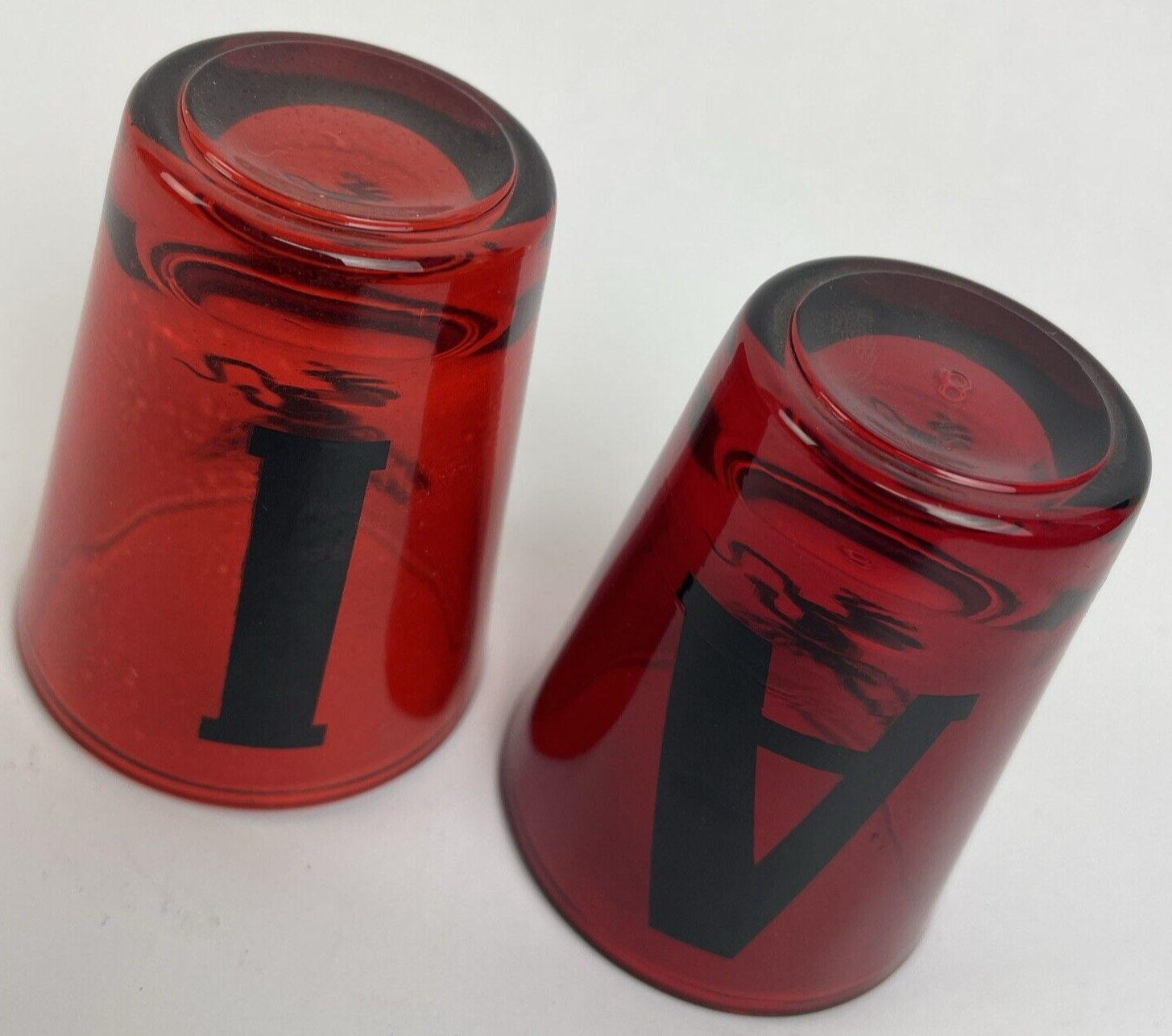 Lot of two Fireball Whisky clear souvenir shot glasses with letters A and I.