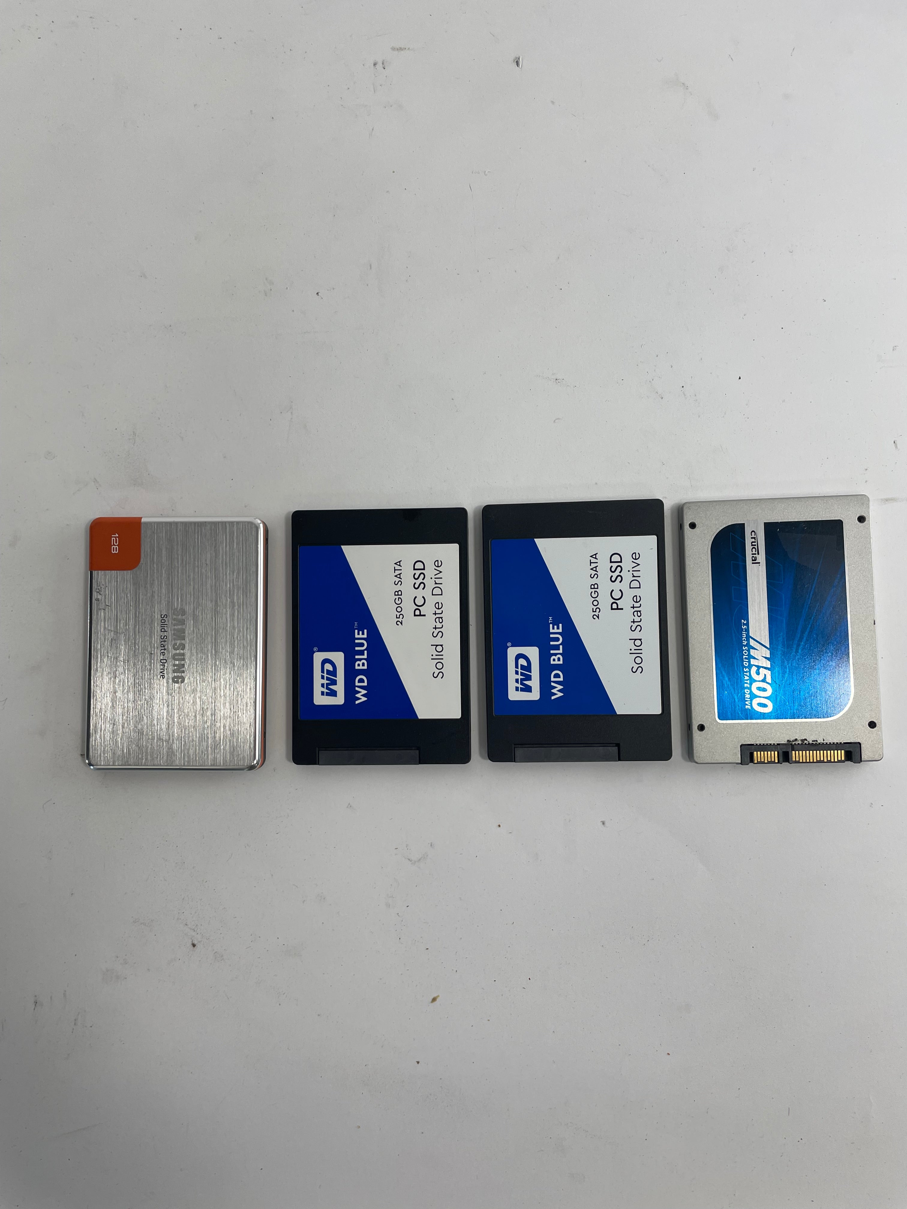 Lot of 4 SSD Drives Samsung 128GB WD Blue 250GB Crucial M500 240GB SATA SSD