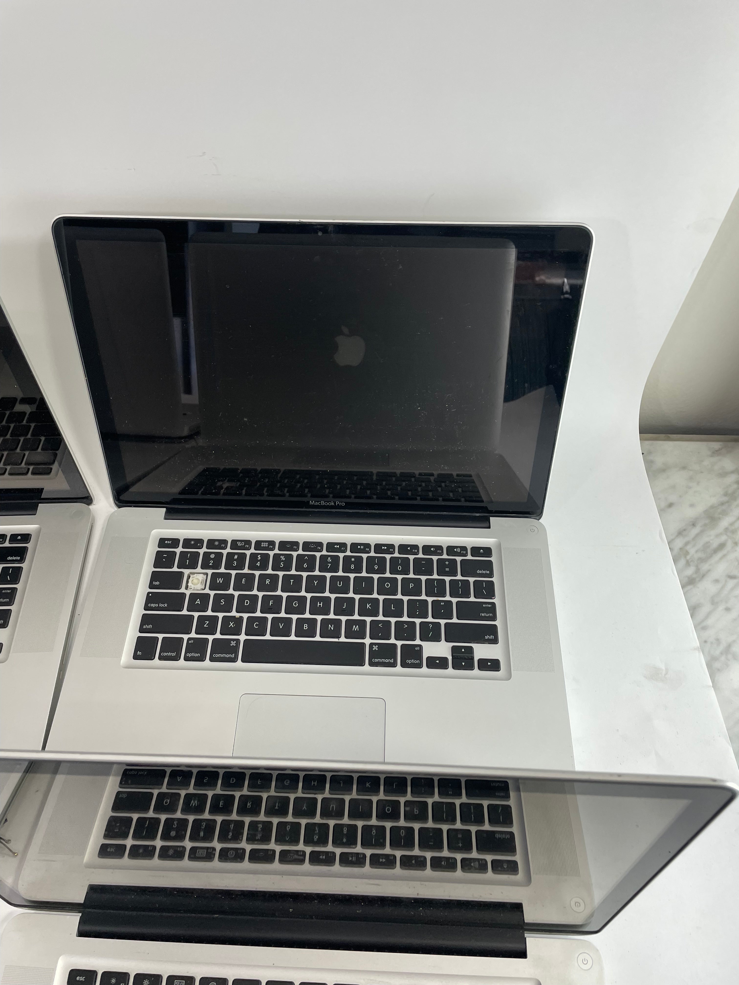 Lot of 4 Apple MacBook Pro A1286 15" Laptops For Parts Repair Not Working